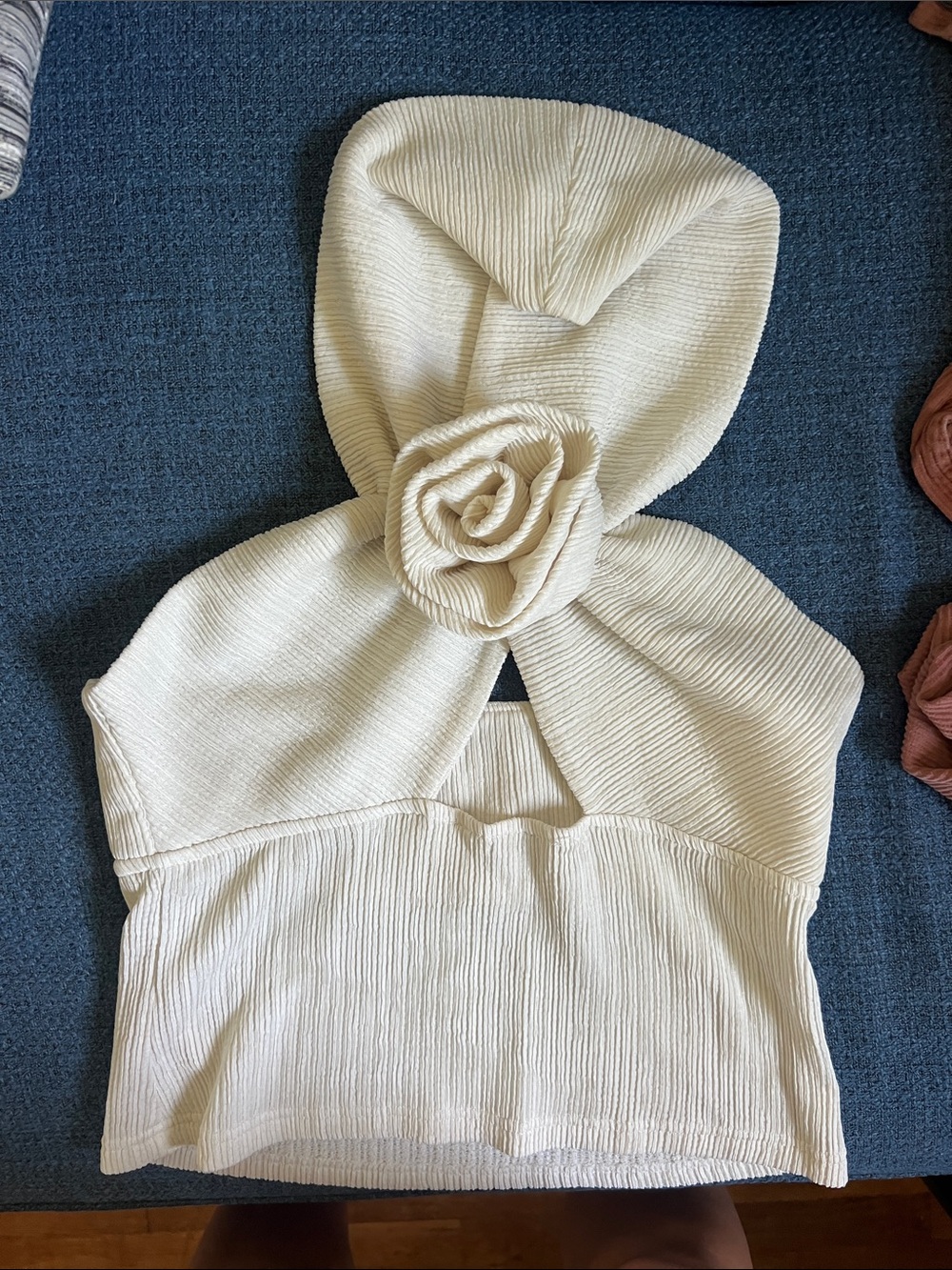 Off-the-Shoulder Cream Hooded Knit Top with Rosette